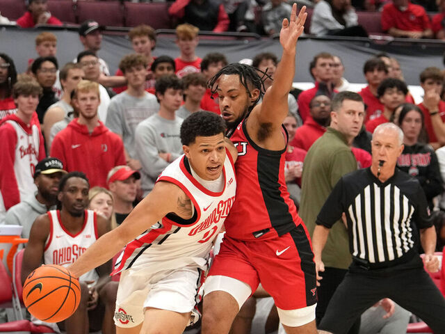 COLUMBUS, OH - NOVEMBER 11: Ohio State Buckeyes guard John Mobley Jr. (0) dribbles around Youngstown State Penguins guard Jason Nelson (0) during the second half of the game between the Ohio State Buckeyes and the Youngstown State Penguins at Value City Arena in Columbus, Ohio on November 11, 2024.