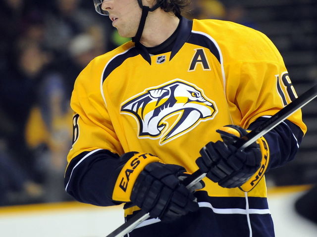 VIDEO: Predators' Neal breaks glass with body check