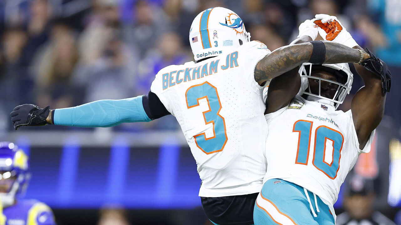 INGLEWOOD, CALIFORNIA - NOVEMBER 11: Tyreek Hill #10 of the Miami Dolphins celebrates with Odell Beckham Jr. #3 after scoring a touchdown against the Los Angeles Rams during the third quarter in the game at SoFi Stadium on November 11, 2024 in Inglewood, California.