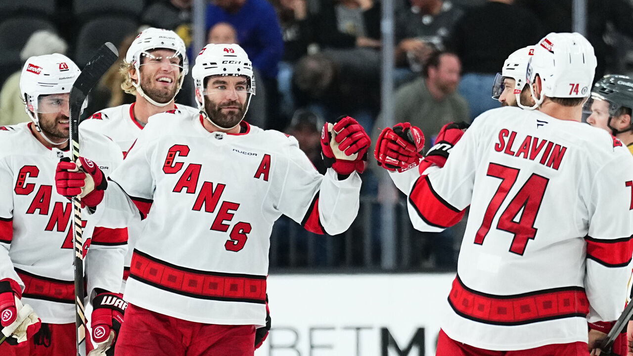 LAS VEGAS, NEVADA - NOVEMBER 11: Jordan Martinook #48 of the Carolina Hurricanes celebrates with teammates after a goal during the third period against the Vegas Golden Knights at T-Mobile Arena on November 11, 2024 in Las Vegas, Nevada.