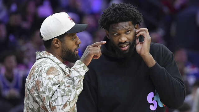 PHILADELPHIA, PENNSYLVANIA - NOVEMBER 2: Paul George #8 of the Philadelphia 76ers talks to Joel Embiid #21 against the Memphis Grizzlies at the Wells Fargo Center on November 2, 2024 in Philadelphia, Pennsylvania. The Grizzlies defeated the 76ers 124-107. NOTE TO USER: User expressly acknowledges and agrees that, by downloading and/or using this photograph, user is consenting to the terms and conditions of the Getty Images License Agreement.