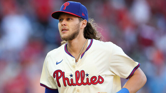 PHILADELPHIA, PA - OCTOBER 05: Alec Bohm #28 of the Philadelphia Phillies returns to the dugout in the third inning during Game 1 of the Division Series presented by Booking.com between the New York Mets and the Philadelphia Phillies at Citizens Bank Park on Saturday, October 5, 2024 in Philadelphia, Pennsylvania.