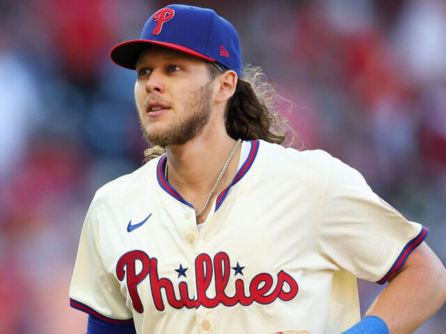PHILADELPHIA, PA - OCTOBER 05: Alec Bohm #28 of the Philadelphia Phillies returns to the dugout in the third inning during Game 1 of the Division Series presented by Booking.com between the New York Mets and the Philadelphia Phillies at Citizens Bank Park on Saturday, October 5, 2024 in Philadelphia, Pennsylvania.