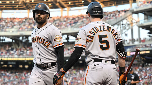 WASHINGTON, DC - JULY 22: LaMonte Wade Jr. #31 of the San Francisco Giants celebrates with Mike Yastrzemski #5 after scoring in the third inning against the Washington Nationals at Nationals Park on July 22, 2023 in Washington, DC.