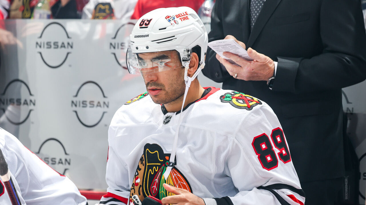 WINNIPEG, CANADA - OCTOBER 11: Andreas Athanasiou #89 of the Chicago Blackhawks looks on from the bench prior to puck drop against the Winnipeg Jets at the Canada Life Centre on October 11, 2024 in Winnipeg, Manitoba, Canada.