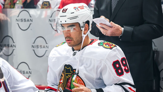 WINNIPEG, CANADA - OCTOBER 11: Andreas Athanasiou #89 of the Chicago Blackhawks looks on from the bench prior to puck drop against the Winnipeg Jets at the Canada Life Centre on October 11, 2024 in Winnipeg, Manitoba, Canada.