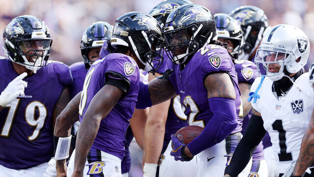 BALTIMORE, MARYLAND - SEPTEMBER 15: Lamar Jackson #8 and Derrick Henry #22 of the Baltimore Ravens celebrate a touchdown during the fourth quarter against the Las Vegas Raiders at M&T Bank Stadium on September 15, 2024 in Baltimore, Maryland.