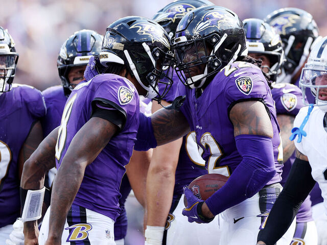 BALTIMORE, MARYLAND - SEPTEMBER 15: Lamar Jackson #8 and Derrick Henry #22 of the Baltimore Ravens celebrate a touchdown during the fourth quarter against the Las Vegas Raiders at M&T Bank Stadium on September 15, 2024 in Baltimore, Maryland.