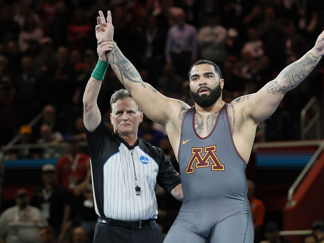 DETROIT, MI - MARCH 19: Gable Steveson of the Minnesota Golden Gophers defeats Cohlton Schultz of the Arizona State Sun Devils in the 285-pound final match during the Division I Men's Wrestling Championship held at Little Caesars Arena on March 19, 2022 in Detroit, Michigan.
