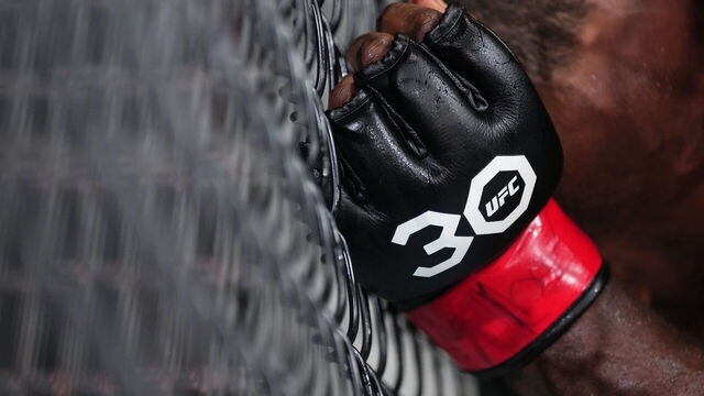 NASHVILLE, TENNESSEE - AUGUST 05: Detail view of the gloves of Jeremiah Wells as he battles Carlston Harris of Guyana in a welterweight fight during the UFC Fight Night event at Bridgestone Arena on August 05, 2023 in Nashville, Tennessee.
