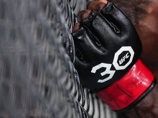NASHVILLE, TENNESSEE - AUGUST 05: Detail view of the gloves of Jeremiah Wells as he battles Carlston Harris of Guyana in a welterweight fight during the UFC Fight Night event at Bridgestone Arena on August 05, 2023 in Nashville, Tennessee.