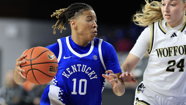 LEXINGTON, KENTUCKY - NOVEMBER 12: Dazia Lawrence #10 of the Kentucky Wildcats drives to the basket against Sara Deidda #24 of the Wofford Terriers during the second half at Rupp Arena on November 12, 2024 in Lexington, Kentucky.
