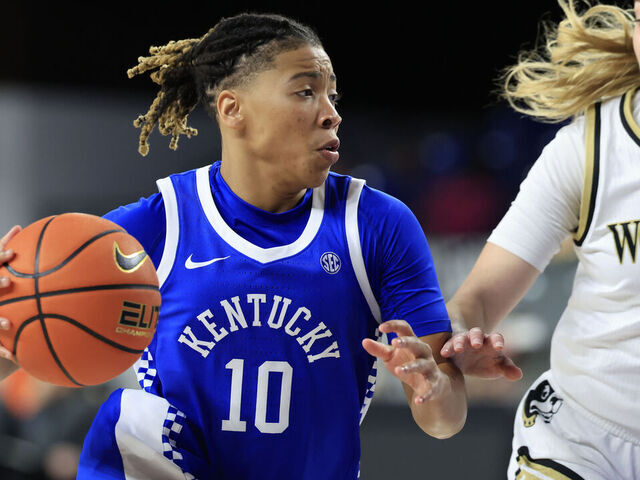 LEXINGTON, KENTUCKY - NOVEMBER 12: Dazia Lawrence #10 of the Kentucky Wildcats drives to the basket against Sara Deidda #24 of the Wofford Terriers during the second half at Rupp Arena on November 12, 2024 in Lexington, Kentucky.