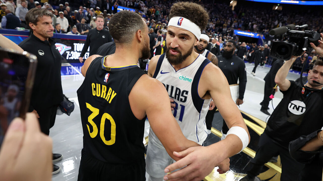 SAN FRANCISCO, CALIFORNIA - NOVEMBER 12: Klay Thompson #31 of the Dallas Mavericks hugs former teammate Stephen Curry #30 of the Golden State Warriors after their game at Chase Center on November 12, 2024 in San Francisco, California. This is Thompson's first game back in Golden State after he was traded to Dallas after last season. NOTE TO USER: User expressly acknowledges and agrees that, by downloading and/or using this photograph, user is consenting to the terms and conditions of the Getty Images License Agreement.