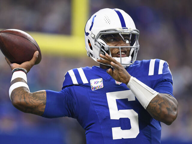 INDIANAPOLIS, IN - OCTOBER 20: Indianapolis Colts Quarterback Anthony Richardson (5) passes during a timeout in the NFL game between the Miami Dolphins and the Indianapolis Colts on October 20, 2024, at Lucas Oil Stadium in Indianapolis, Indiana.