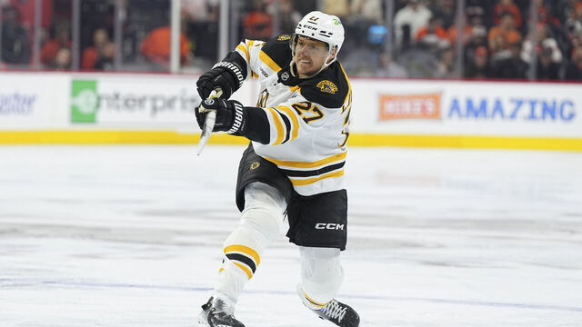 PHILADELPHIA, PENNSYLVANIA - NOVEMBER 2: Hampus Lindholm #27 of the Boston Bruins shoots the puck against the Philadelphia Flyers at the Wells Fargo Center on November 2, 2024 in Philadelphia, Pennsylvania. The Bruins defeated the Flyers 3-0.