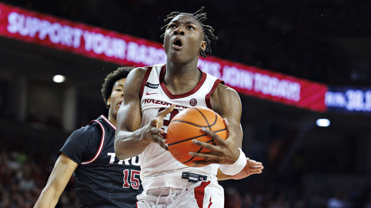FAYETTEVILLE, ARKANSAS - NOVEMBER 13: Adou Thiero #3 of the Arkansas Razorbacks goes for a layup in the second half of a game against the Troy Trojans at Bud Walton Arena on November 13, 2024 in Fayetteville, Arkansas. The Razorbacks defeated the Trojans 65-49.