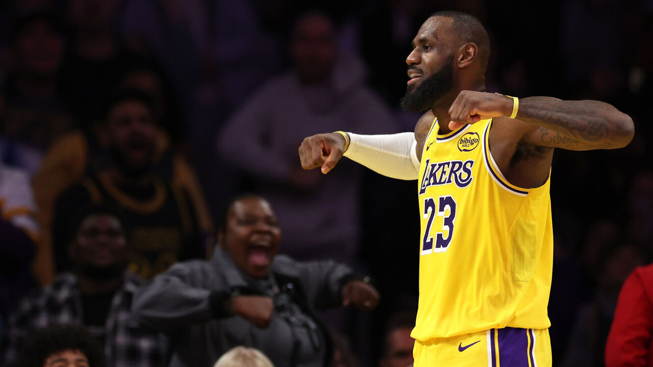 LOS ANGELES, CALIFORNIA - NOVEMBER 13: LeBron James #23 of the Los Angeles Lakers reacts after a made basket against the Memphis Grizzlies during the fourth quarter at Crypto.com Arena on November 13, 2024 in Los Angeles, California.