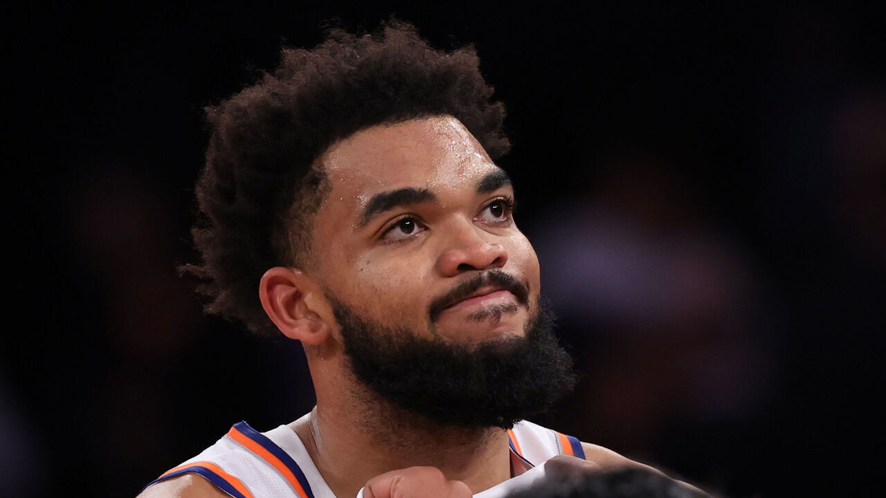 NEW YORK, NEW YORK - NOVEMBER 13: Karl-Anthony Towns #32 of the New York Knicks reacts after his team was defeated by the Chicago Bulls at Madison Square Garden on November 13, 2024 in New York City.
