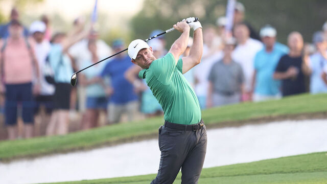 DUBAI, UNITED ARAB EMIRATES - NOVEMBER 14: Rory McIlroy of Northern Ireland plays his second shot on the 18th hole during day one of the DP World Tour Championship 2024 at Jumeirah Golf Estates on November 14, 2024 in Dubai, United Arab Emirates.