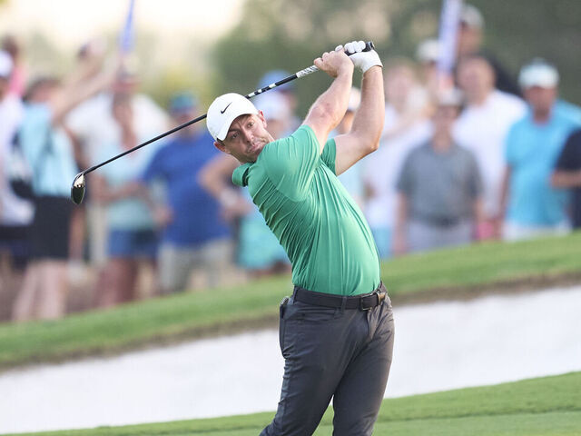 DUBAI, UNITED ARAB EMIRATES - NOVEMBER 14: Rory McIlroy of Northern Ireland plays his second shot on the 18th hole during day one of the DP World Tour Championship 2024 at Jumeirah Golf Estates on November 14, 2024 in Dubai, United Arab Emirates.