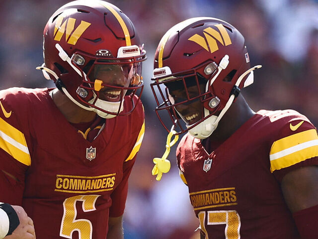LANDOVER, MARYLAND - SEPTEMBER 15: Tyler Biadasz #63, Jayden Daniels #5 and Terry McLaurin #17 of the Washington Commanders react during the fourth quarter against the New York Giants at Northwest Stadium on September 15, 2024 in Landover, Maryland.