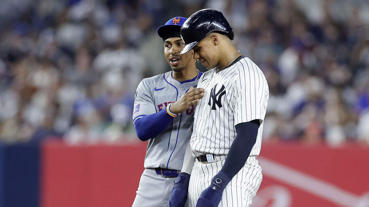 NEW YORK, NEW YORK - JULY 24: Juan Soto #22 of the New York Yankees stands at second base during the fifth inning with Francisco Lindor #12 of the New York Mets at Yankee Stadium on July 24, 2024 in New York City.