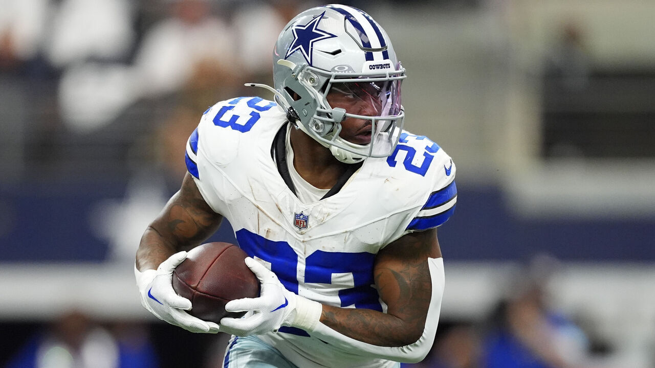 ARLINGTON, TEXAS - SEPTEMBER 15: Rico Dowdle #23 of the Dallas Cowboys runs with the ball during the first half against the New Orleans Saints at AT&T Stadium on September 15, 2024 in Arlington, Texas.