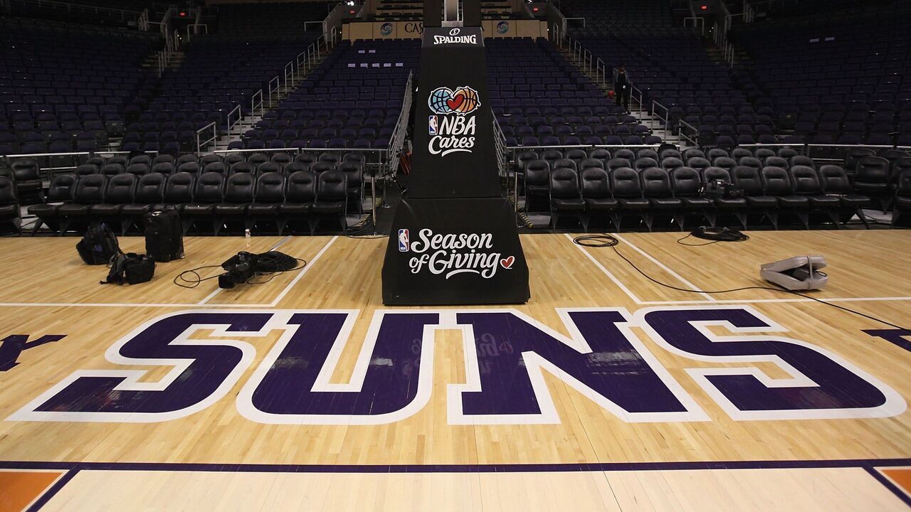 PHOENIX - DECEMBER 11: The Phoenix Suns logo is seen on the court before the NBA game against the Orlando Magic at US Airways Center on December 11, 2009 in Phoenix, Arizona. The Suns defeated the Magic 106-103.