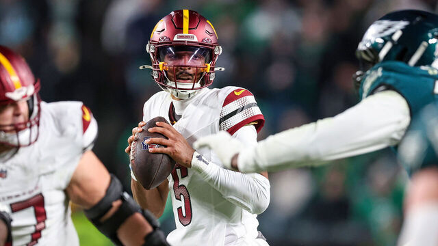 PHILADELPHIA, PENNSYLVANIA - NOVEMBER 14: Jayden Daniels #5 of the Washington Commanders looks to pass against the Philadelphia Eagles during the third quarter at Lincoln Financial Field on November 14, 2024 in Philadelphia, Pennsylvania.