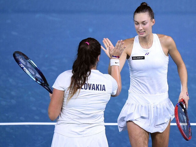Viktoria Hruncakova (L) and Tereza Mihalikova, of team Slovakia, celebrate a point against Ashlyn Krueger and Taylor Townsend, of team USA, during their doubles tennis match between Slovakia and USA at the Billie Jean King Cup Finals at the Palacio de Deportes Jose Maria Martin Carpena in Malaga, Spain, on November 14, 2024.