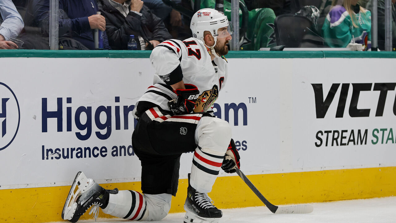 DALLAS, TX - NOVEMBER 07: Chicago Blackhawks left wing Nick Foligno (17) gets up after being into the boards during the game between the Dallas Stars and the Chicago Blackhawks on November 7, 2024 at American Airlines Center in Dallas, Texas.