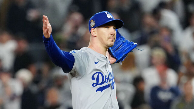 NEW YORK, NY - OCTOBER 30: Walker Buehler #21 of the Los Angeles Dodgers reacts after closing out the ninth inning to win during Game 5 of the 2024 World Series presented by Capital One between the Los Angeles Dodgers and the New York Yankees at Yankee Stadium on Wednesday, October 30, 2024 in New York, New York.