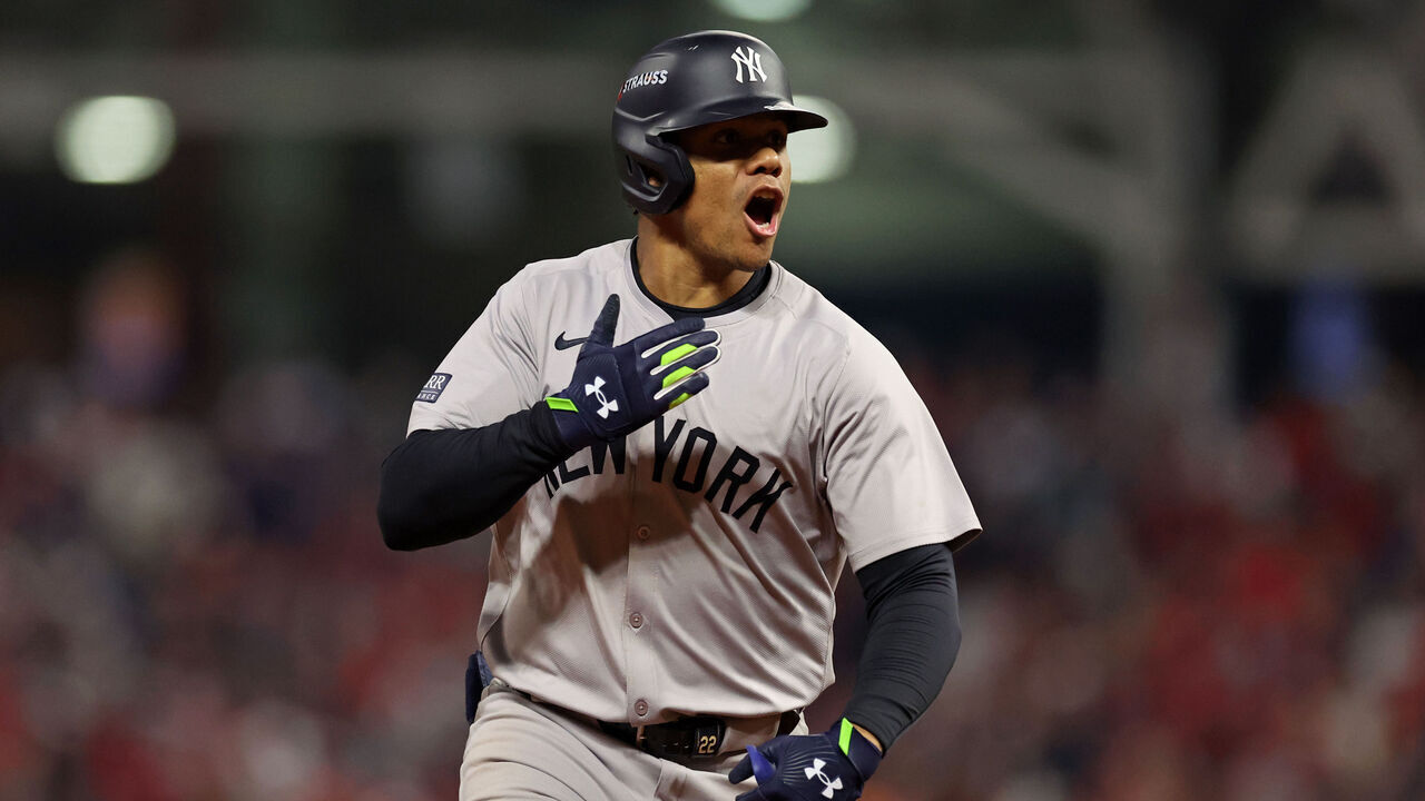 CLEVELAND, OHIO - OCTOBER 19: Juan Soto #22 of the New York Yankees hits a three-run home run during the tenth inning of Game Five of the American League Championship Series against the Cleveland Guardians at Progressive Field on October 19, 2024 in Cleveland, Ohio.