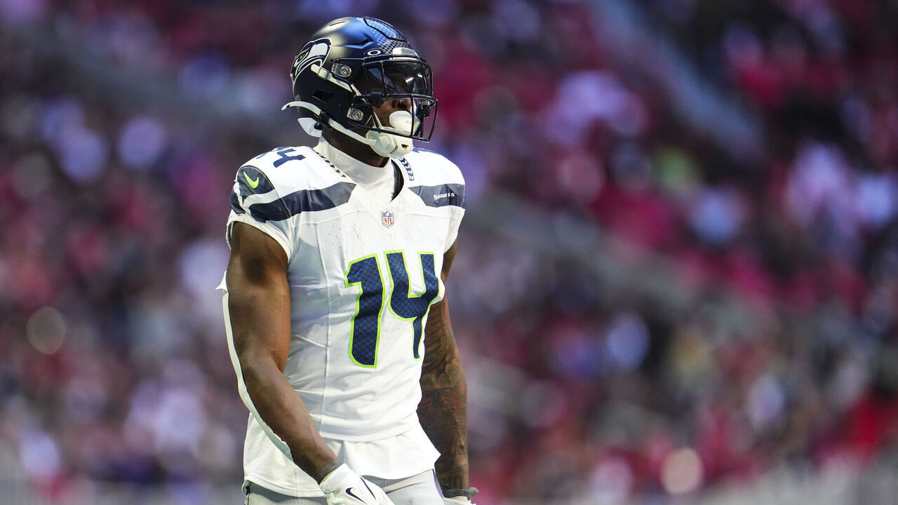 ATLANTA, GA - OCTOBER 20: DK Metcalf #14 of the Seattle Seahawks looks on from the field during an NFL football game against the Atlanta Falcons at Mercedes-Benz Stadium on October 20, 2024 in Atlanta, Georgia.
