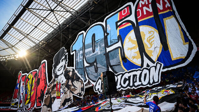 Lyon's supporters spread a tifo during the French L1 football match between Lyon (OL) and Auxerre (AJA) at the Parc Olympique Lyonnais stadium in Decines-Charpieu near Lyon, central-eastern France, on October 27, 2024.