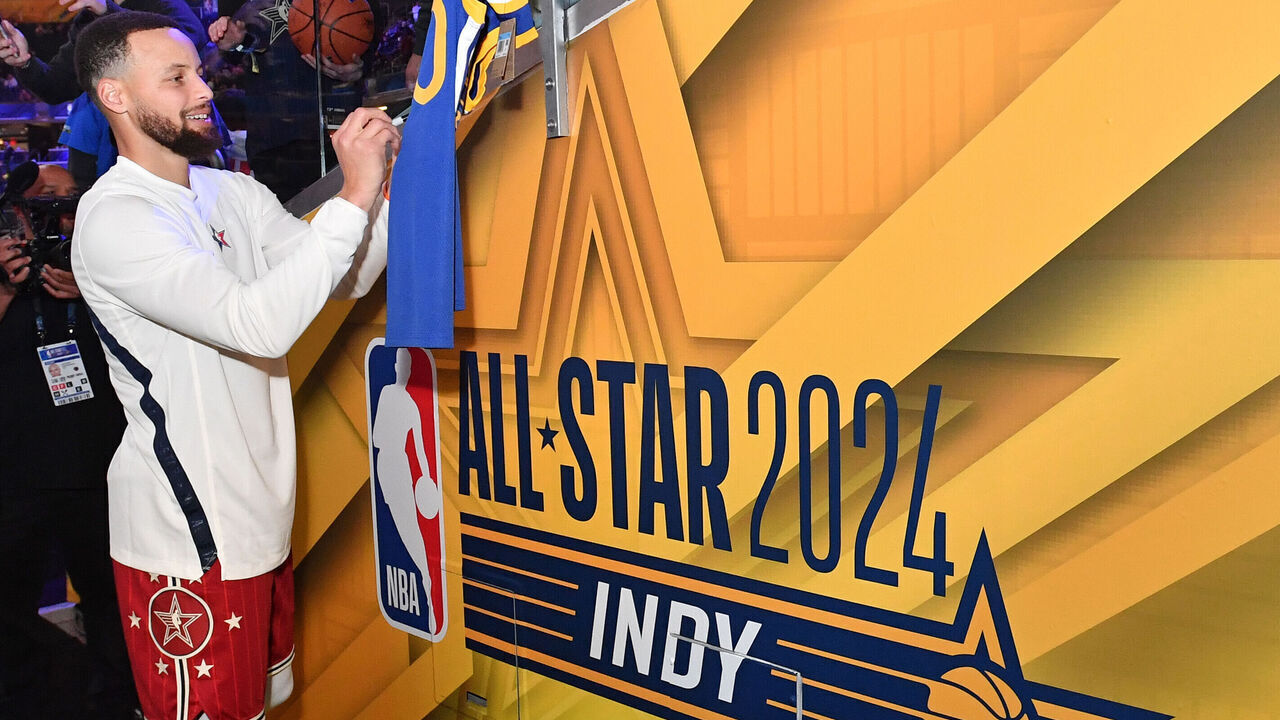 INDIANAPOLIS, IN - FEBRUARY 18: Stephen Curry #30 of the Western Conference autographs a jersey during the NBA All-Star Game as part of NBA All-Star Weekend on Sunday, February 18, 2024 at Gainbridge Fieldhouse in Indianapolis, Indiana. NOTE TO USER: User expressly acknowledges and agrees that, by downloading and/or using this Photograph, user is consenting to the terms and conditions of the Getty Images License Agreement. Mandatory Copyright Notice: Copyright 2024 NBAE