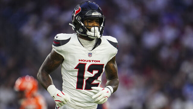 HOUSTON, TX - SEPTEMBER 15: Nico Collins #12 of the Houston Texans runs across the field during an NFL football game against the Chicago Bears during a football game at NRG Stadium on September 15, 2024 in Houston, Texas.