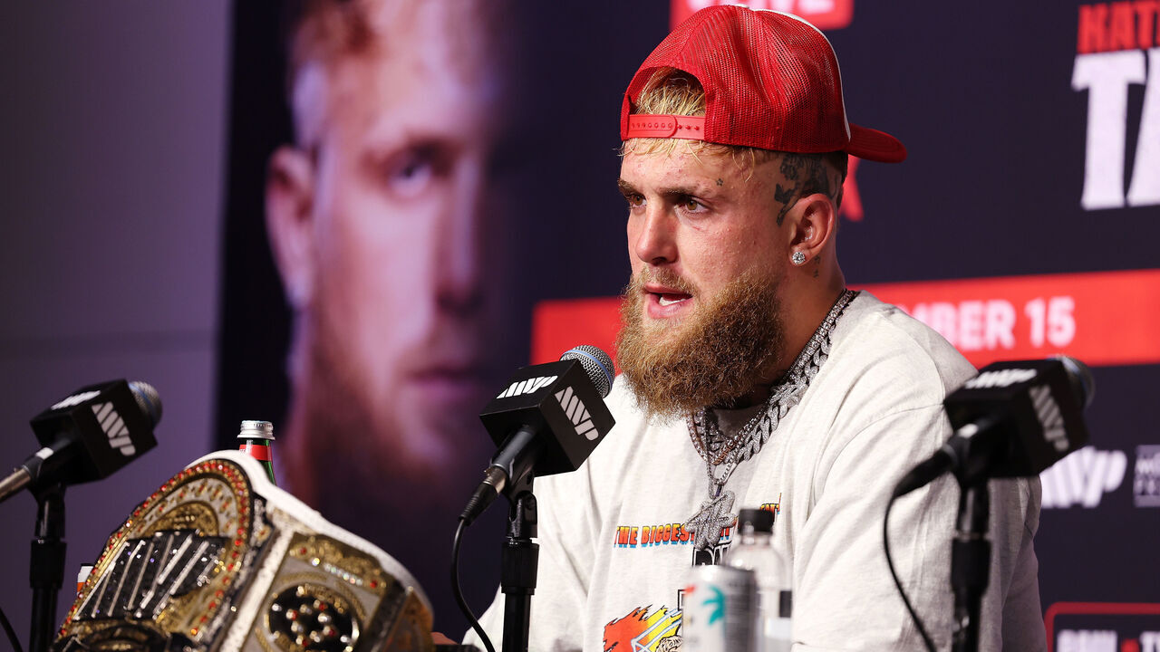 ARLINGTON, TEXAS - NOVEMBER 15: Jake Paul speaks during the post match press conference for LIVE On Netflix: Jake Paul vs. Mike Tyson at AT&T Stadium on November 15, 2024 in Arlington, Texas.