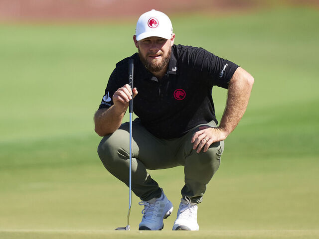 DUBAI, UNITED ARAB EMIRATES - NOVEMBER 16: Tyrrell Hatton of England studies a putt on the 1st green on day three of the DP World Tour Championship 2024 on the Earth Course at Jumeirah Golf Estates on November 16, 2024 in Dubai, United Arab Emirates.