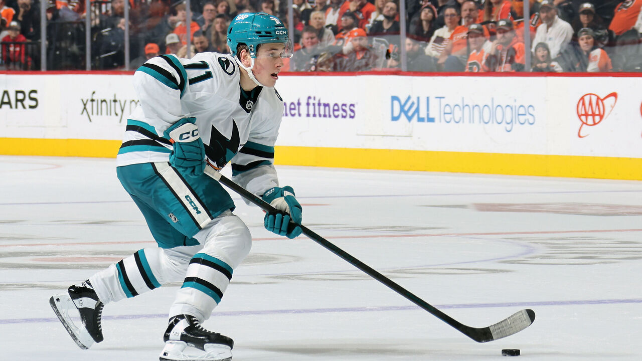 PHILADELPHIA, PENNSYLVANIA - NOVEMBER 11: Macklin Celebrini #71 of the San Jose Sharks skates the puck against the Philadelphia Flyers at the Wells Fargo Center on November 11, 2024 in Philadelphia, Pennsylvania.