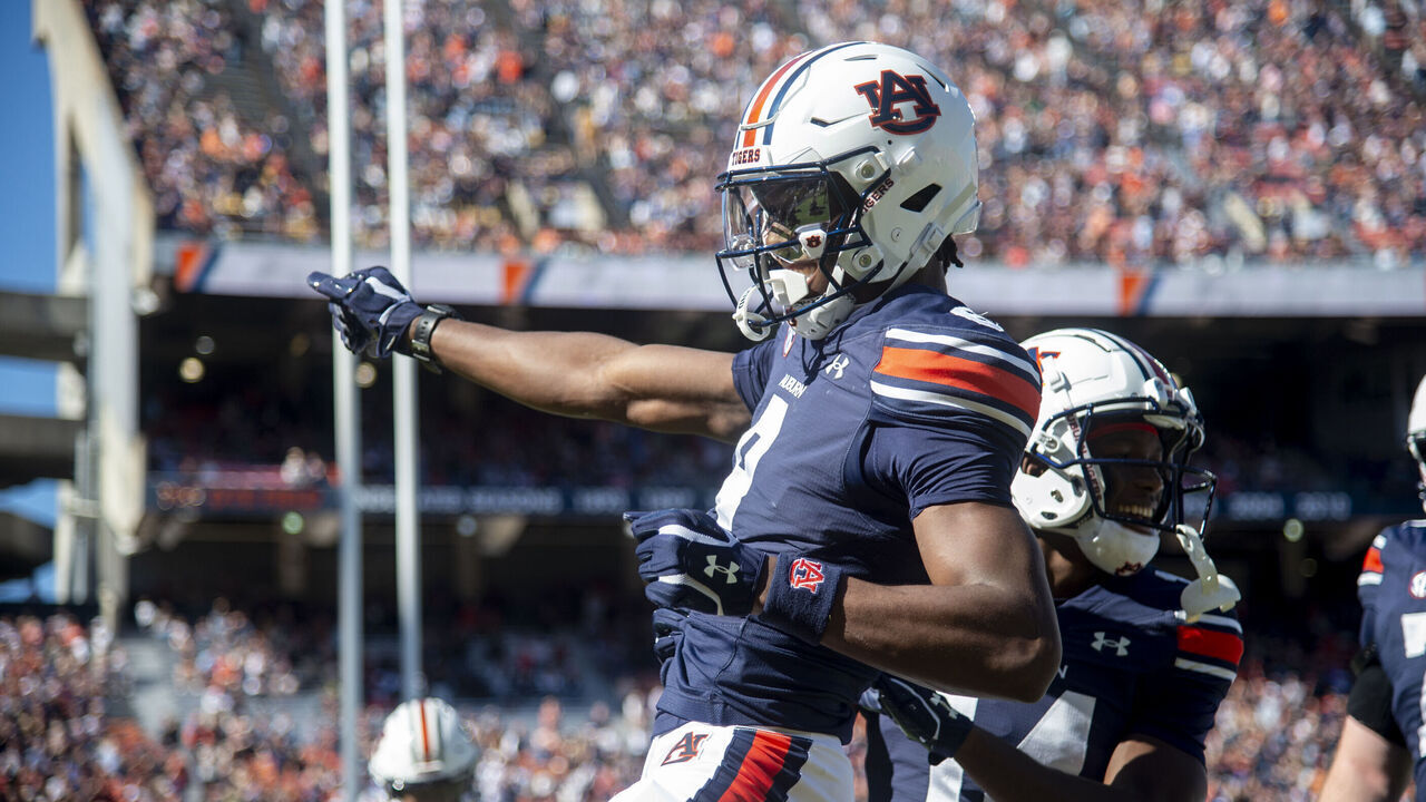 AUBURN, ALABAMA - NOVEMBER 16: Wide receiver Cam Coleman #8 of the Auburn Tigers celebrates after scoring a touchdown during the first half of their game against the Louisiana Monroe Warhawks at Jordan-Hare Stadium on November 16, 2024 in Auburn, Alabama.