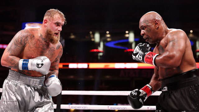 ARLINGTON, TEXAS - NOVEMBER 15: (L-R) Jake Paul and Mike Tyson fight during LIVE On Netflix: Jake Paul vs. Mike Tyson at AT&T Stadium on November 15, 2024 in Arlington, Texas.
