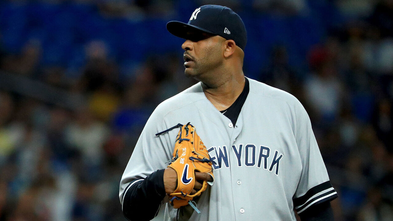 ST PETERSBURG, FLORIDA - SEPTEMBER 24: CC Sabathia #52 of the New York Yankees pitches in the fourth inning during a game against the Tampa Bay Rays at Tropicana Field on September 24, 2019 in St Petersburg, Florida.