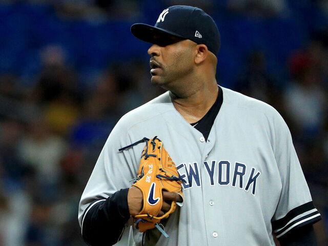 ST PETERSBURG, FLORIDA - SEPTEMBER 24: CC Sabathia #52 of the New York Yankees pitches in the fourth inning during a game against the Tampa Bay Rays at Tropicana Field on September 24, 2019 in St Petersburg, Florida.
