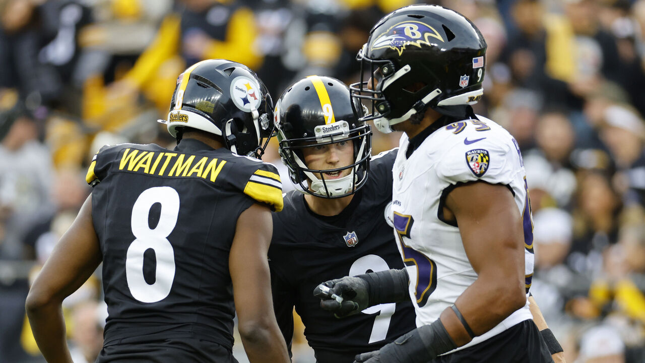 PITTSBURGH, PENNSYLVANIA - NOVEMBER 17: Tavius Robinson #95 of the Baltimore Ravens looks on while Corliss Waitman #8 and Chris Boswell #9 of the Pittsburgh Steelers celebrate after Boswell's field goal in the third quarter of a game at Acrisure Stadium on November 17, 2024 in Pittsburgh, Pennsylvania.