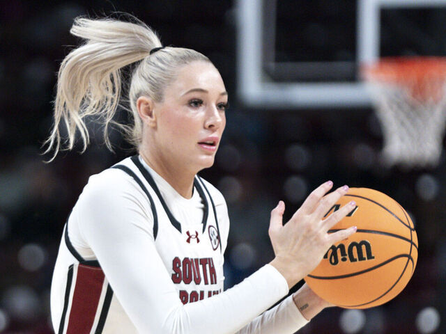 COLUMBIA, SOUTH CAROLINA - NOVEMBER 14: Chloe Kitts #21 of the South Carolina Gamecocks looks to pass the ball during an NCAA women's basketball game against the Coppin State Eagles at Colonial Life Arena on November 14, 2024 in Columbia, South Carolina. South Carolina won 92-60.