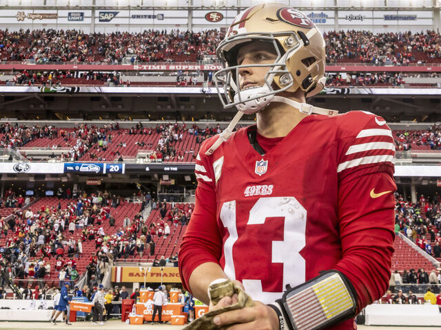 49ers quarterback Brock Purdy (13) waits on the field for players to gather for a prayer after the San Francisco 49ers played the Seattle Seahawks at Levi's Stadium in Santa Clara, Calif., on Sunday, November 17, 2024.