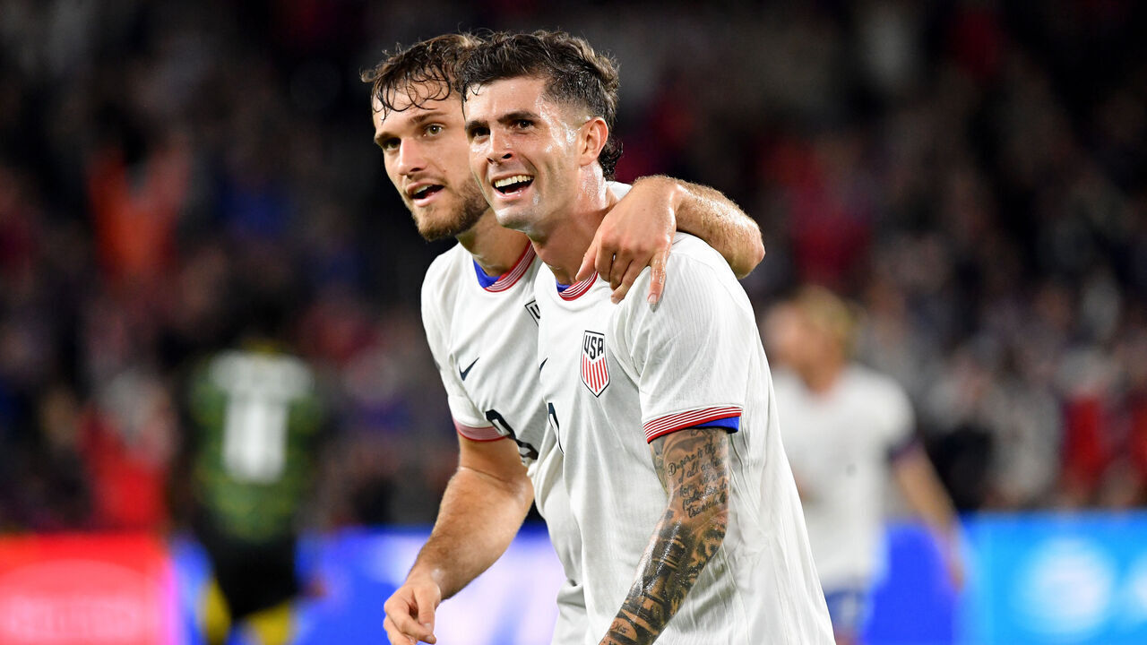 ST LOUIS, MISSOURI - NOVEMBER 18: Christian Pulisic #10 of the United States celebrates scoring with teammate Tanner Tessmann #18 during the first half against Jamaica during leg two of the 2024 Concacaf Nations League Quarterfinals at Citypark on November 18, 2024 in St Louis, Missouri.