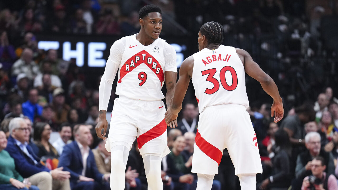 TORONTO, ON - NOVEMBER 18: RJ Barrett #9 and Ochai Agbaji #30 of the Toronto Raptors celebrate against the Indiana Pacers during the first half at the Scotiabank Arena on November 18, 2024 in Toronto, Ontario, Canada. NOTE TO USER: User expressly acknowledges and agrees that, by downloading and/or using this Photograph, user is consenting to the terms and conditions of the Getty Images License Agreement.